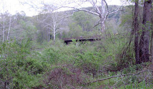 A distant view of the trail where it crosses Oil Creek a few miles into the ride from the Petroleum Center trail head