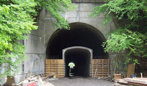 The wall with the archway on top.